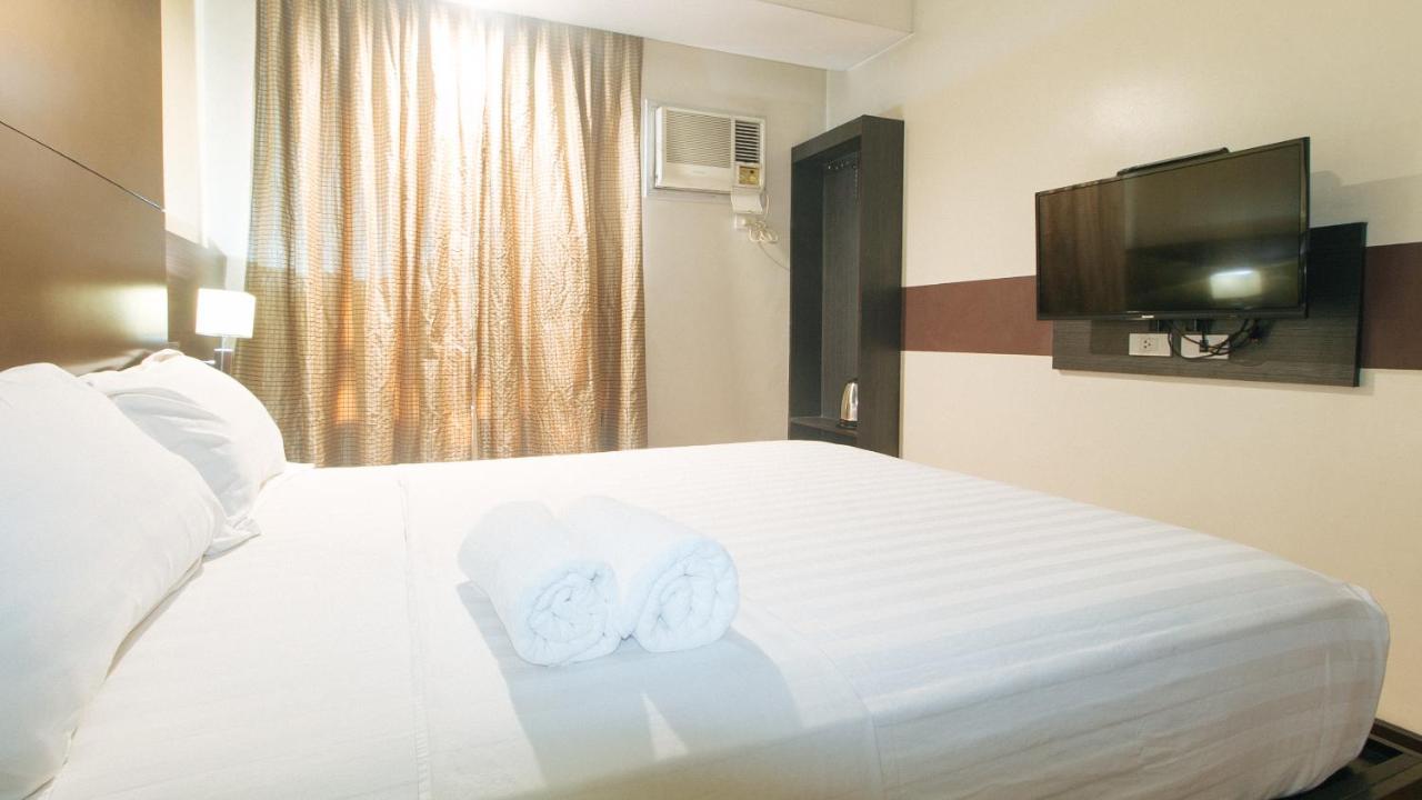 Lorenzzo Suites Hotel Макати Экстерьер фото