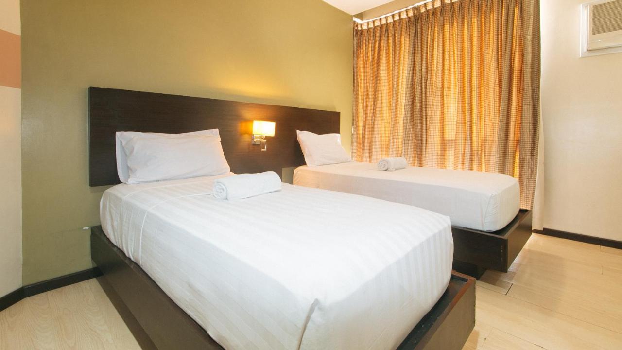 Lorenzzo Suites Hotel Макати Экстерьер фото