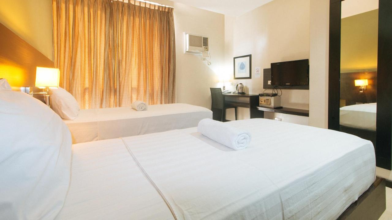 Lorenzzo Suites Hotel Макати Экстерьер фото