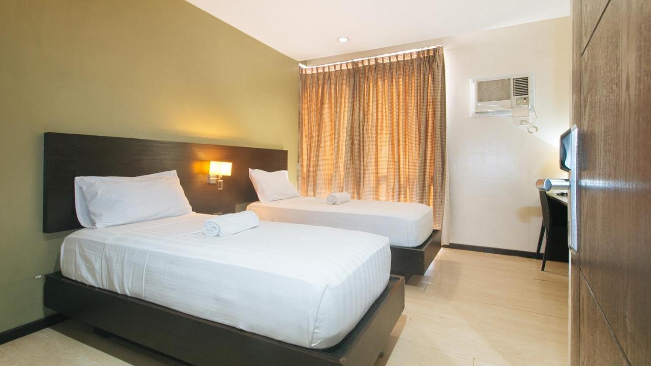 Lorenzzo Suites Hotel Макати Экстерьер фото